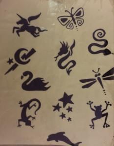 A bunch of silhouettes of animals on a piece of paper
