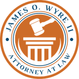 James O. Wyre II Attorney at Law circular logo with orange gavel and courthouse icon