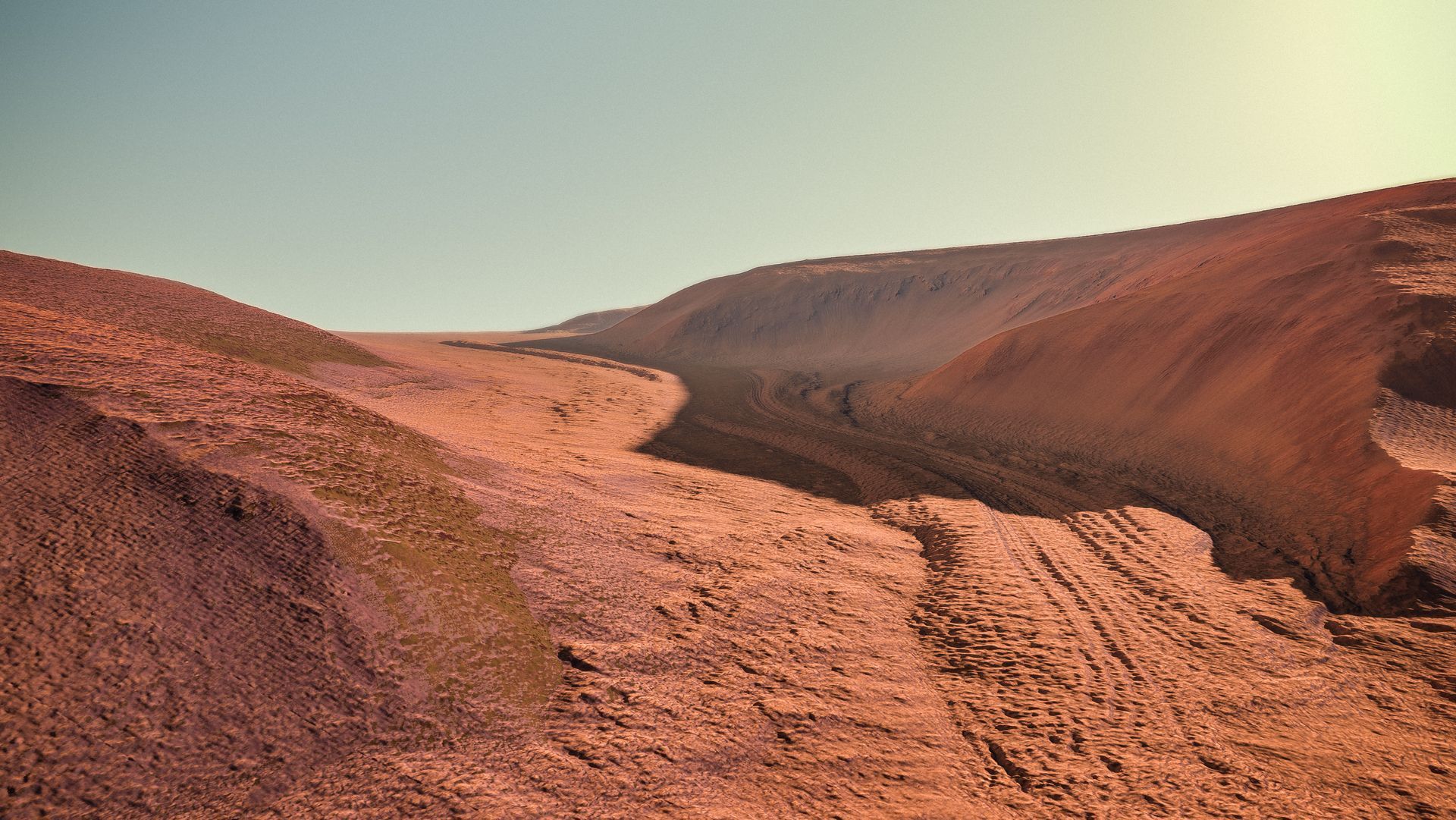Red Mars landscape with a canyon and a pale blue sky.