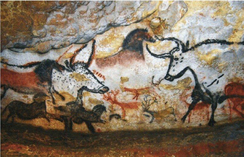 Cave painting of horses and other animals in brown, red, and black.