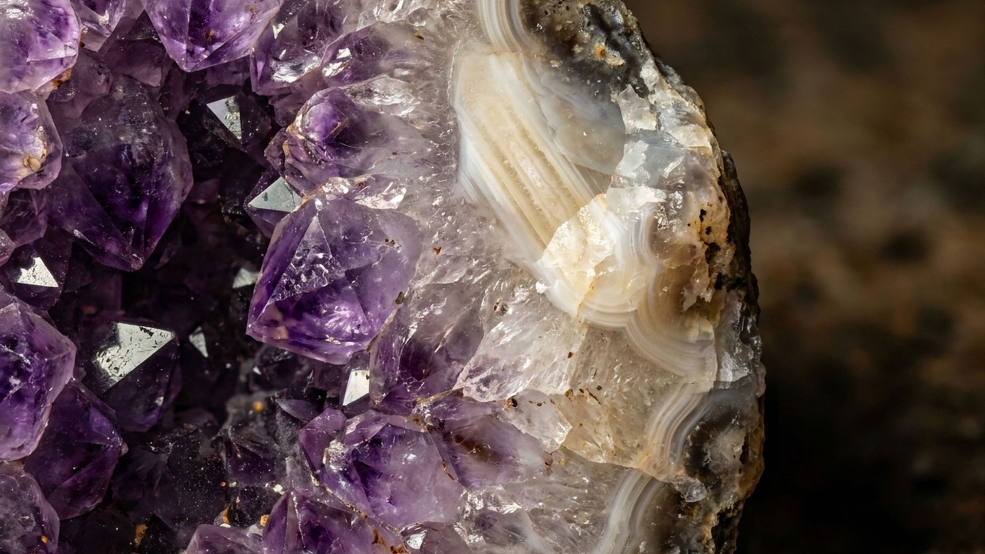 Vugs and geodes are both kinds of cavities in rock. How are they different –