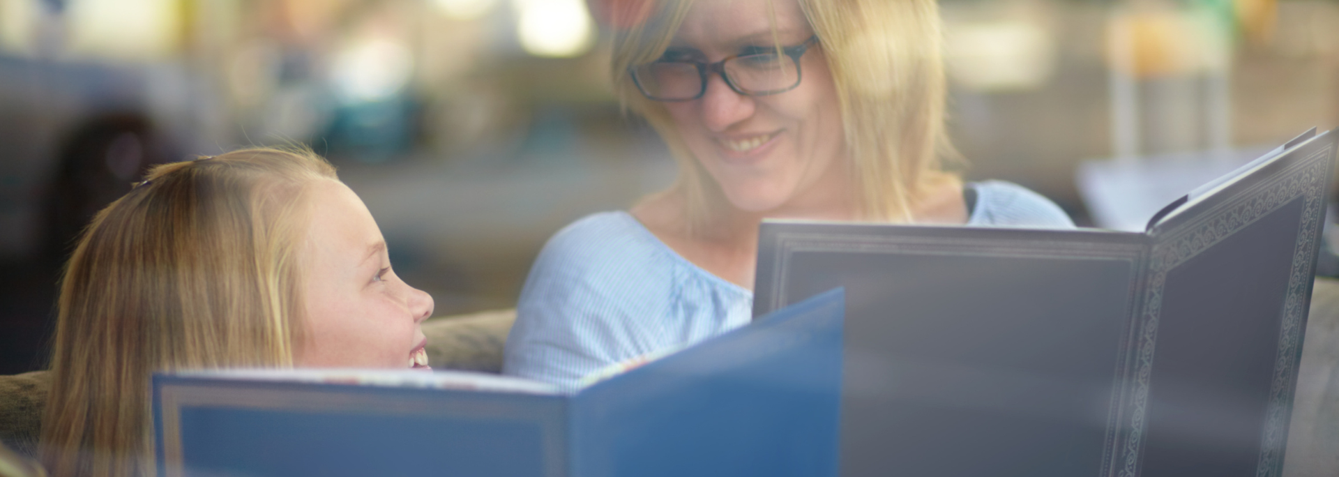 Picture of child and parent reading. Picture of child and parent reading.