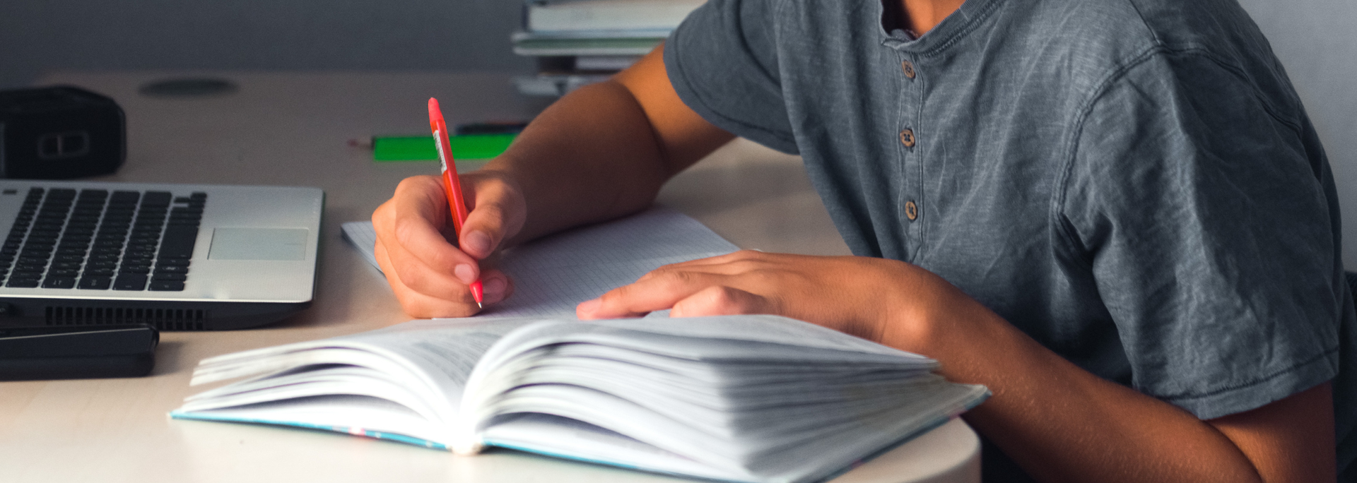 Picture of someone writing. Picture of someone writing.
