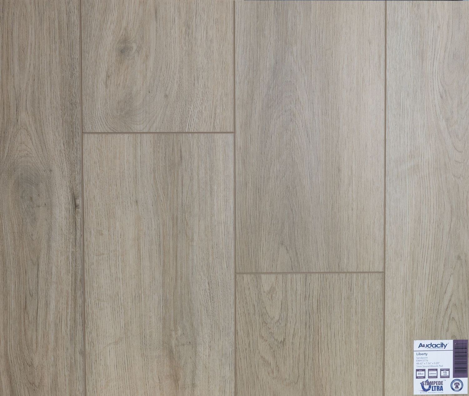 A close up of a wooden floor with a label on it