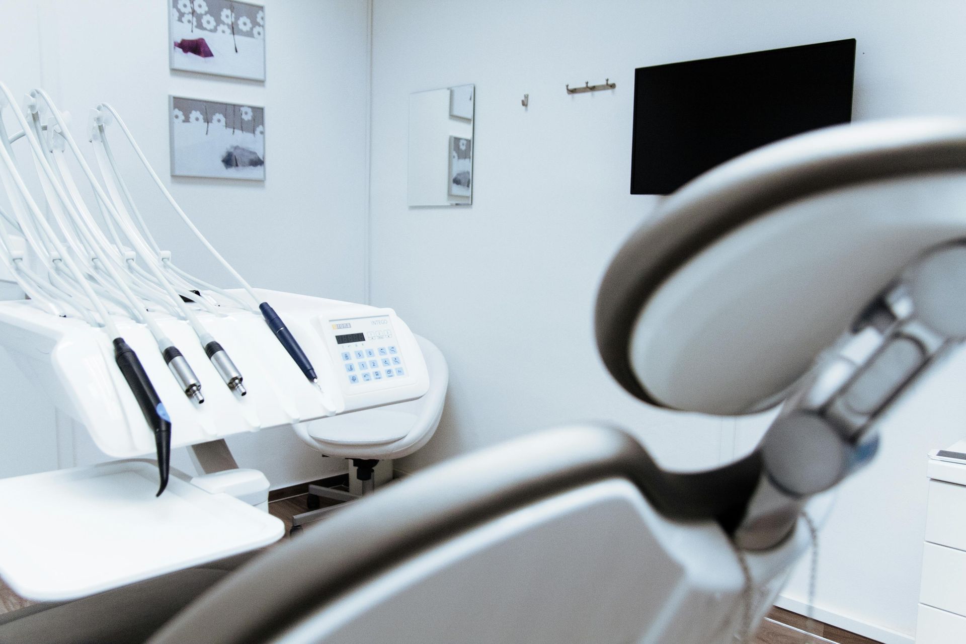 An Empty Dental Chair In A Dental Office — Mittagong Dental Care In Mittagong, NSW