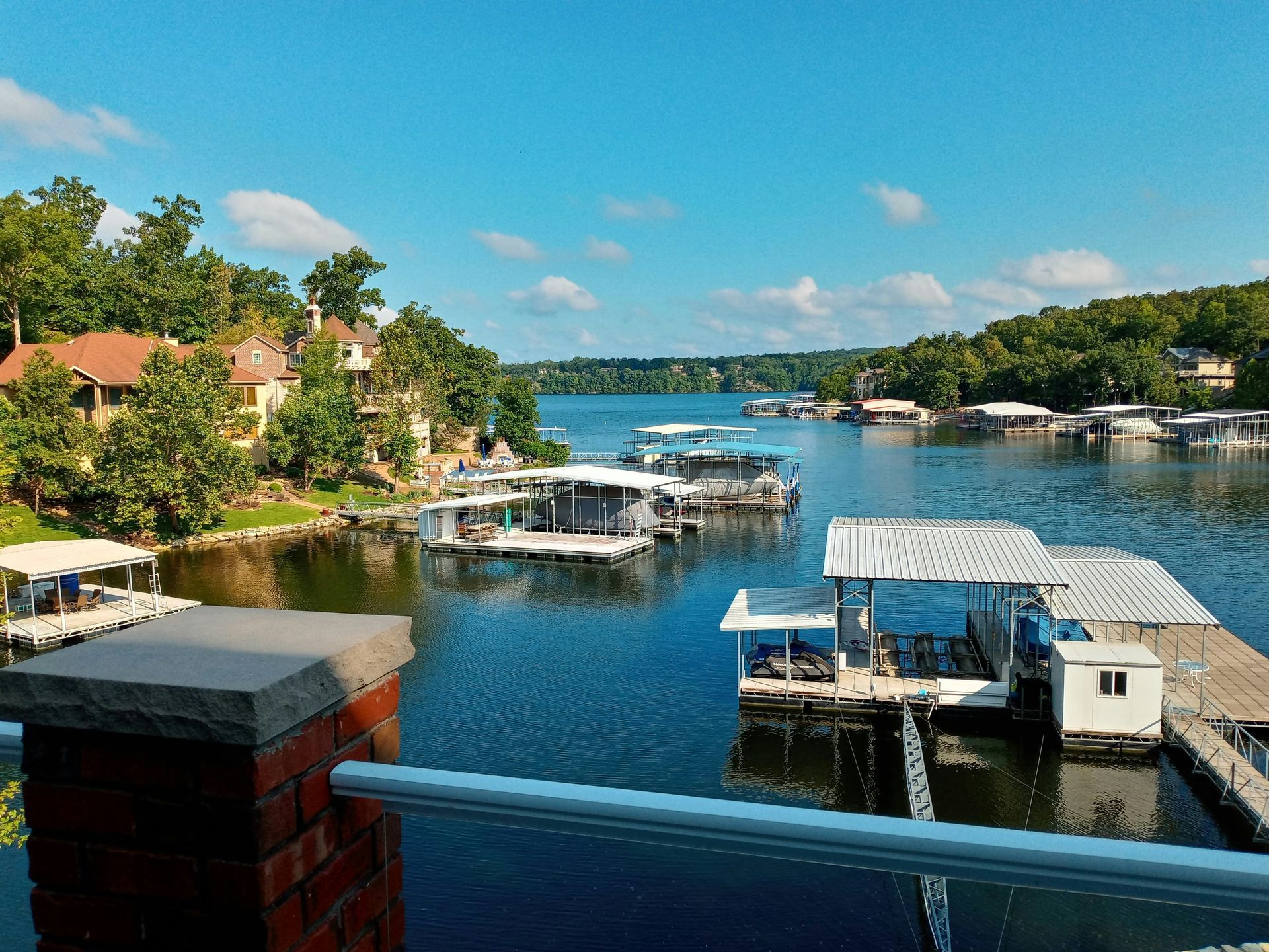 Boats docked at a marina on Lake of the Ozarks, Missouri