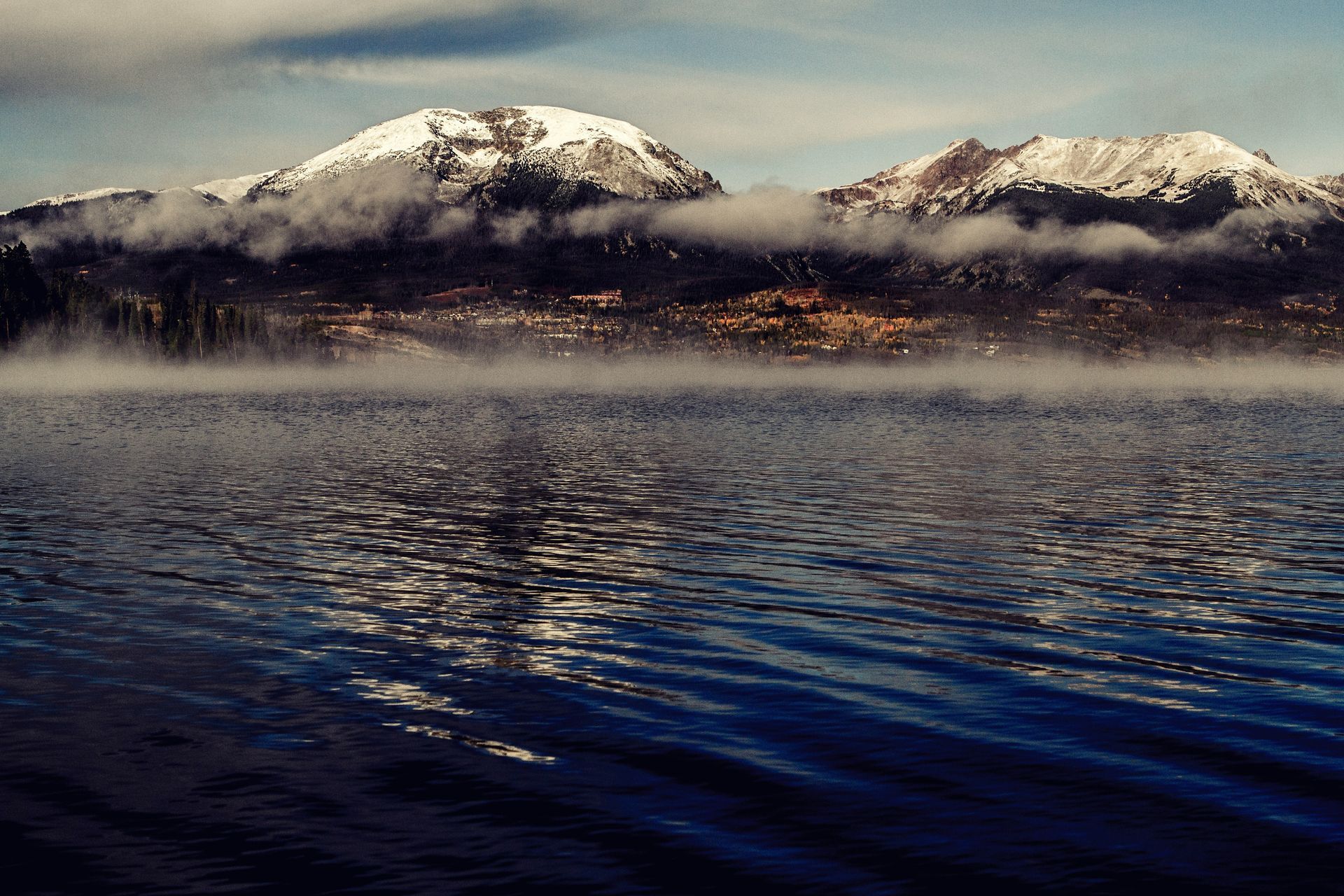 Snow-covered mountains beside a lake in Dillon, Colorado
