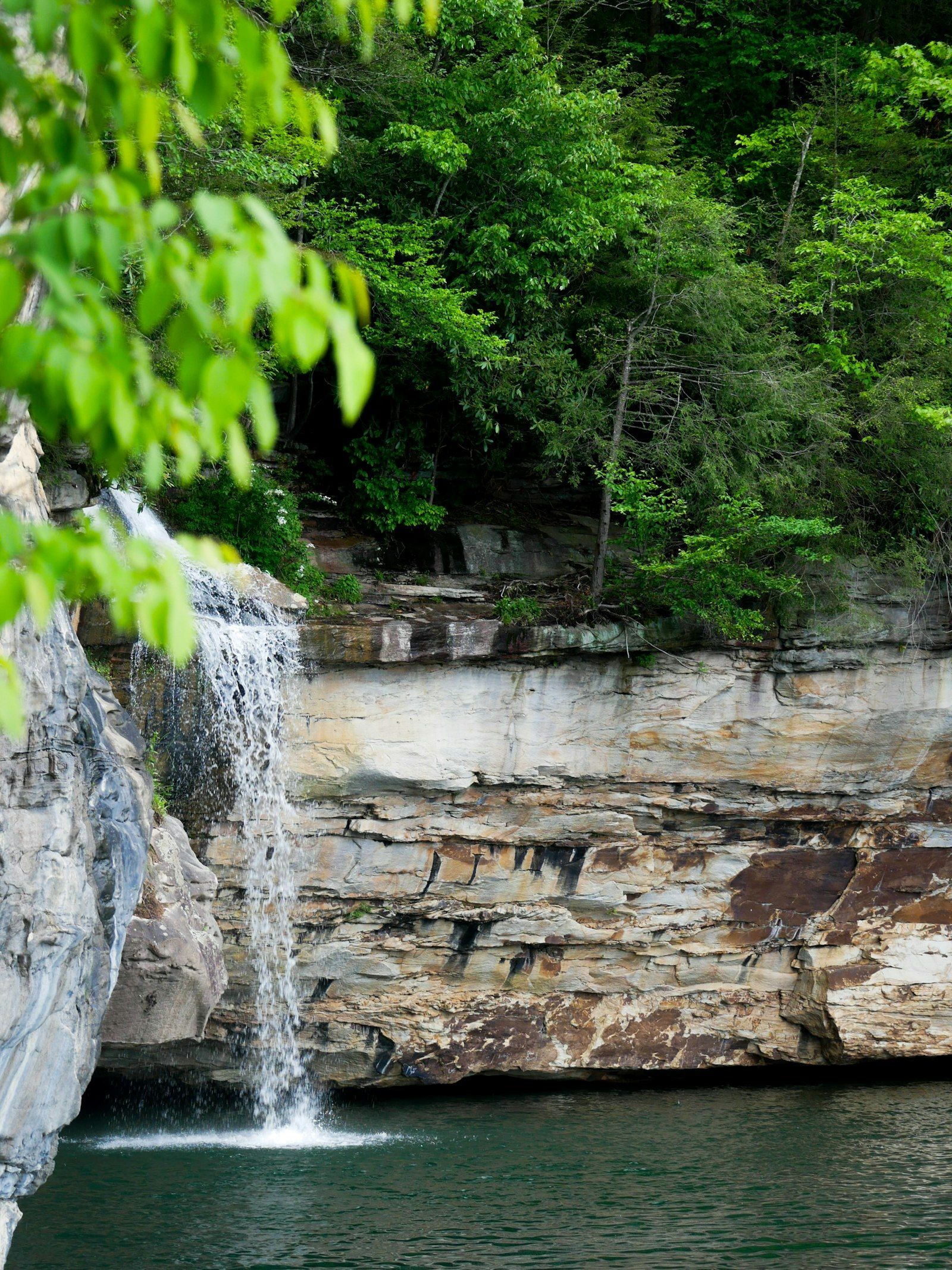 Waterfall flowing into Summersville Lake at Pirates Cove in West Virginia