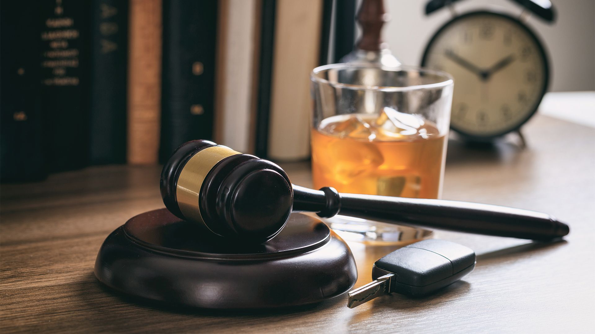 Gavel, Glass of Liquor and Car Key Fob