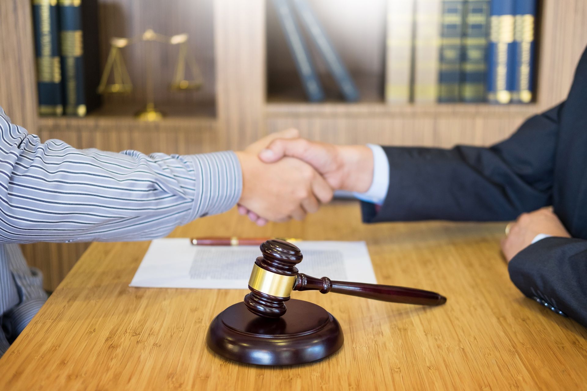 Client and Attorney Shaking Hands