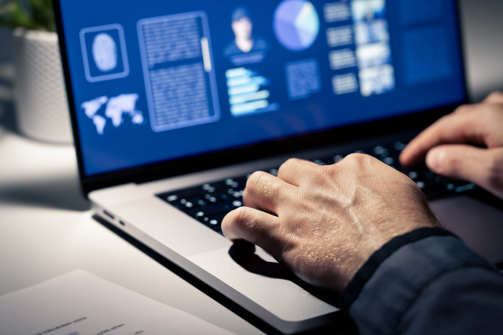 A Person is Typing on a Laptop Computer