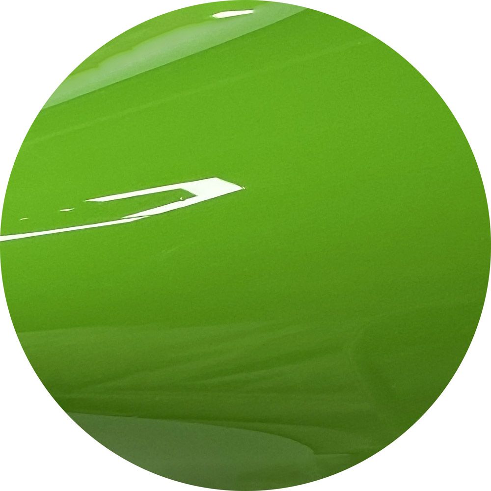 A close up of a green circle on a white background