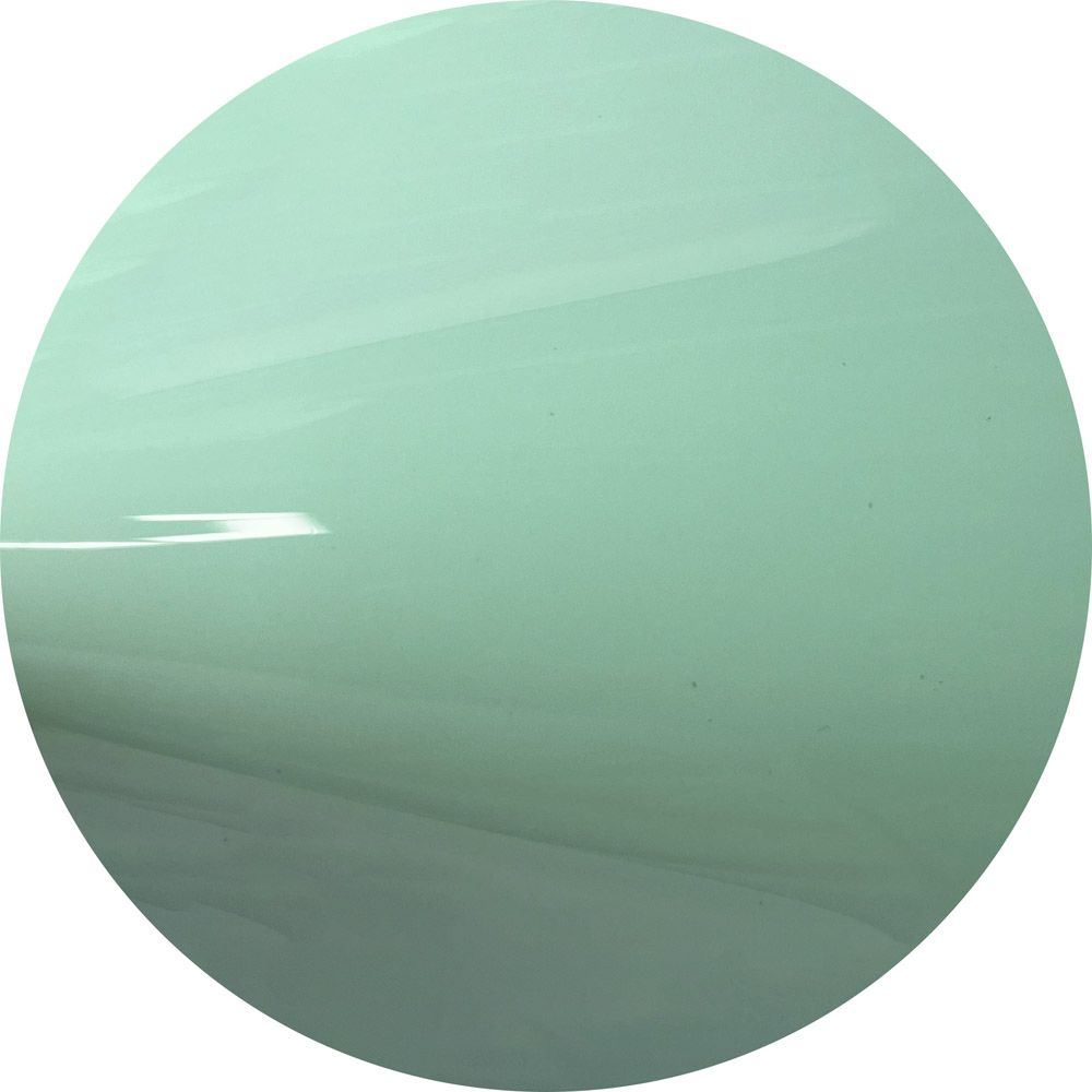 A close up of a green circle on a white background