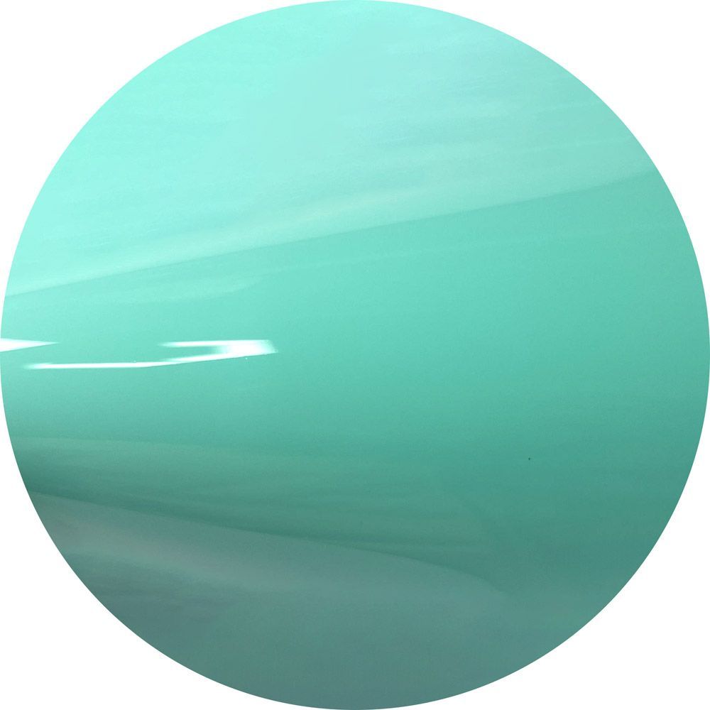 A close up of a green circle on a white background