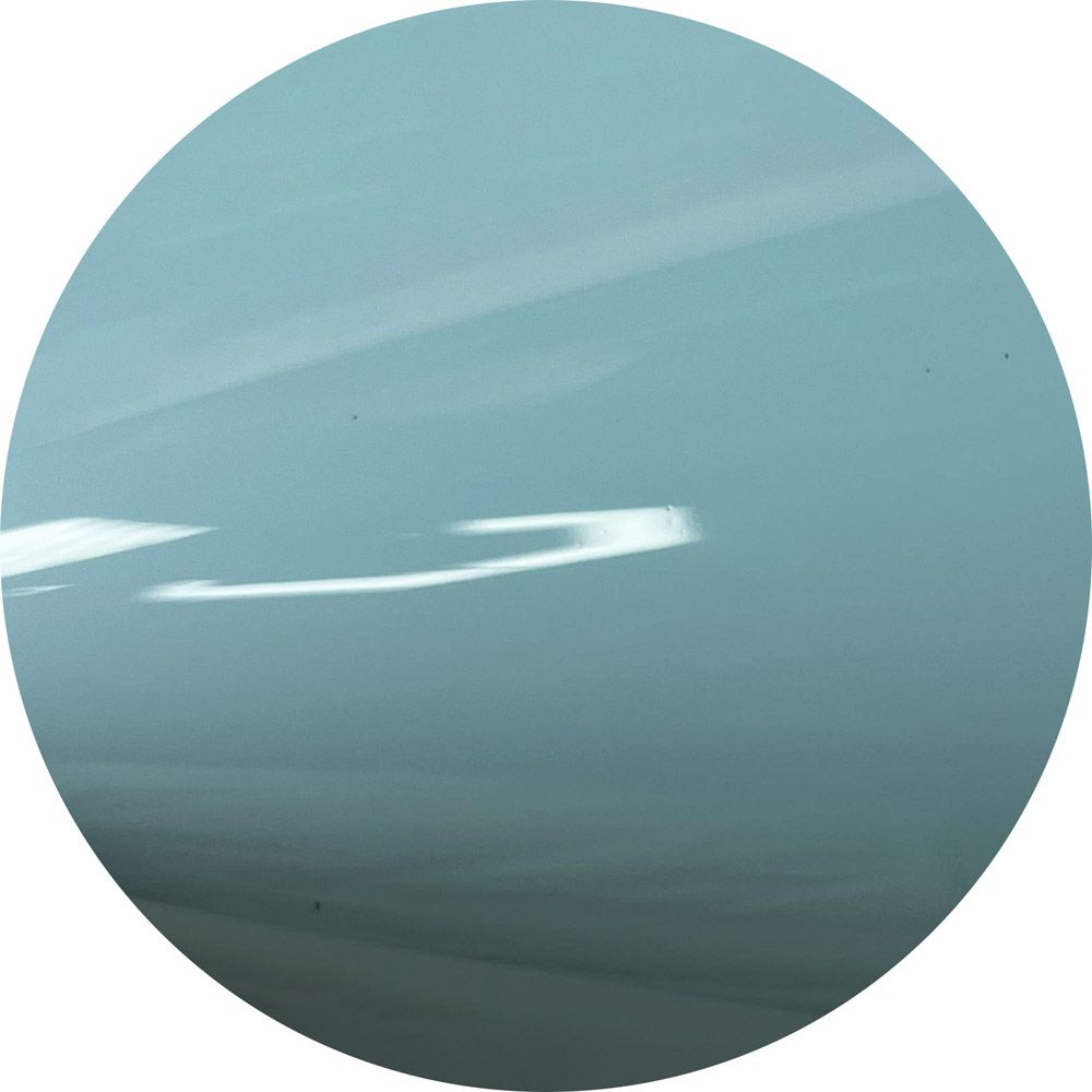 A close up of a blue circle with a white background
