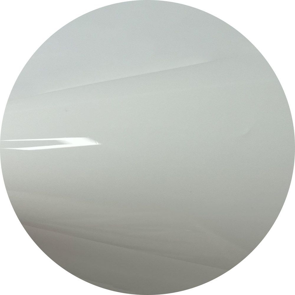 A close up of a white circle on a white background