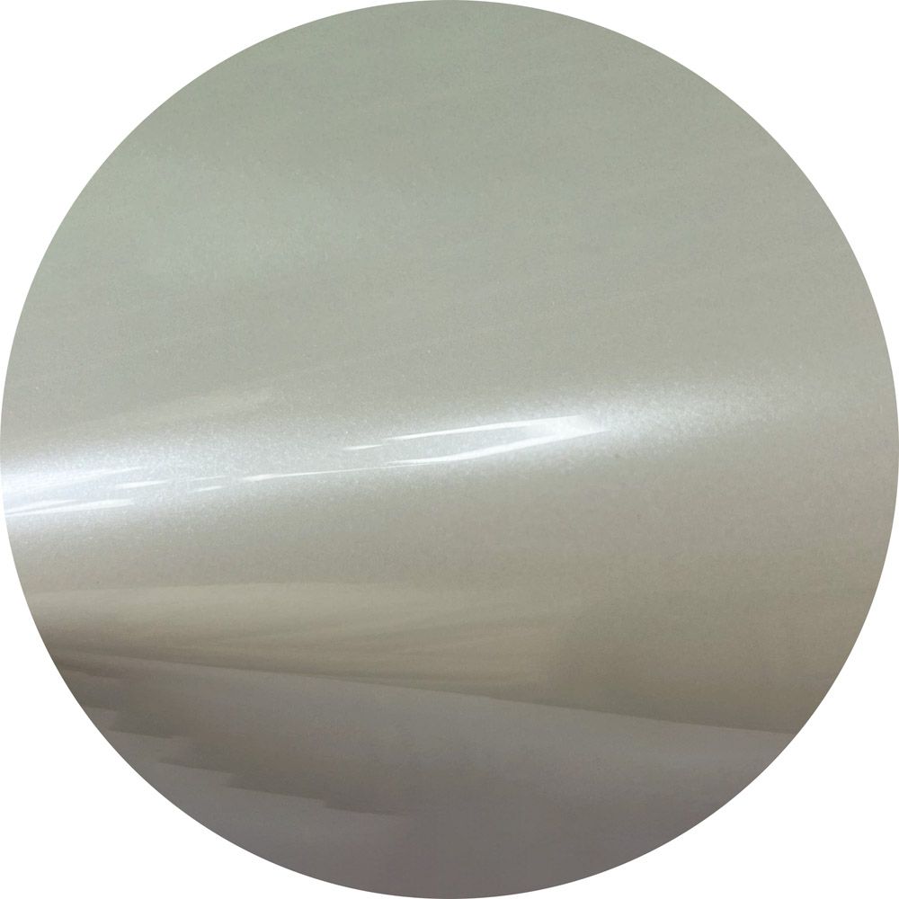 A close up of a white circle on a white background