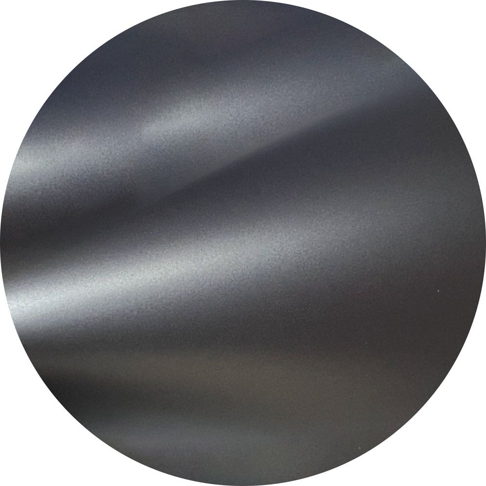 A close up of a black circle with a white background