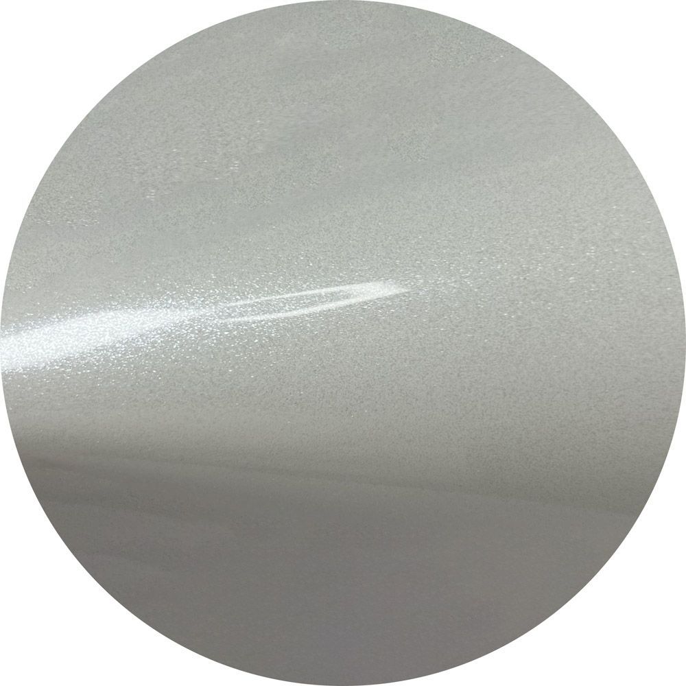 A close up of a white circle on a white background