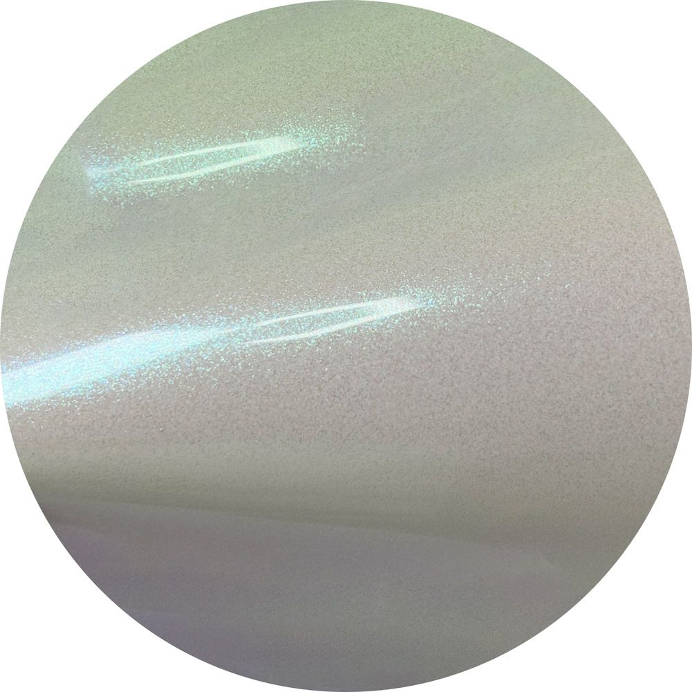 A close up of a shiny white surface in a circle