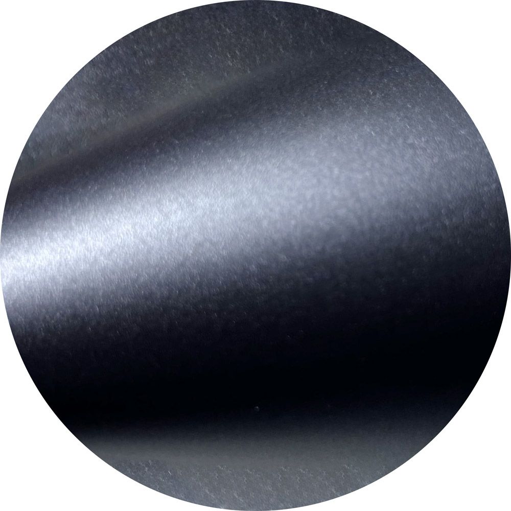 A close up of a black circle with a white background