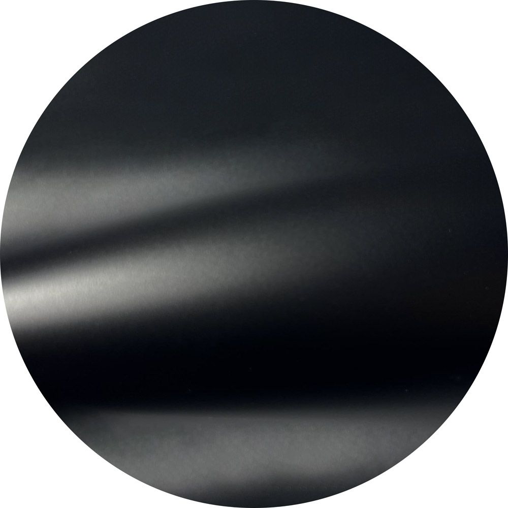 A close up of a black circle on a white background