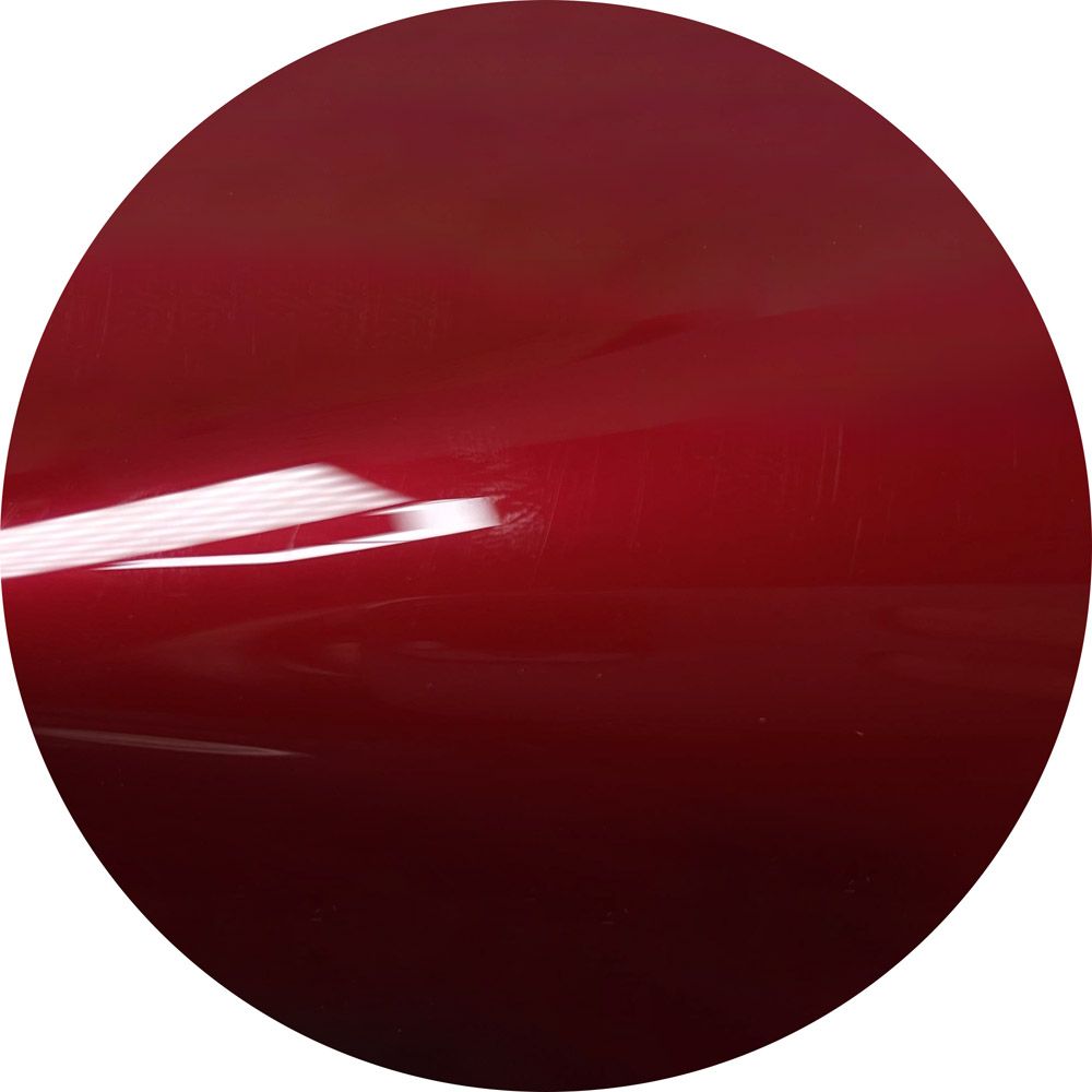 A close up of a red circle on a white background