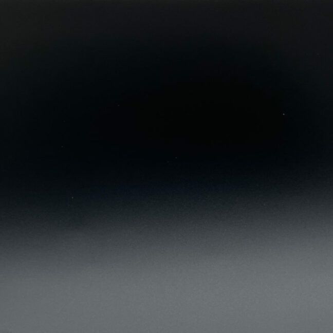 A black background with a gray gradient in the middle