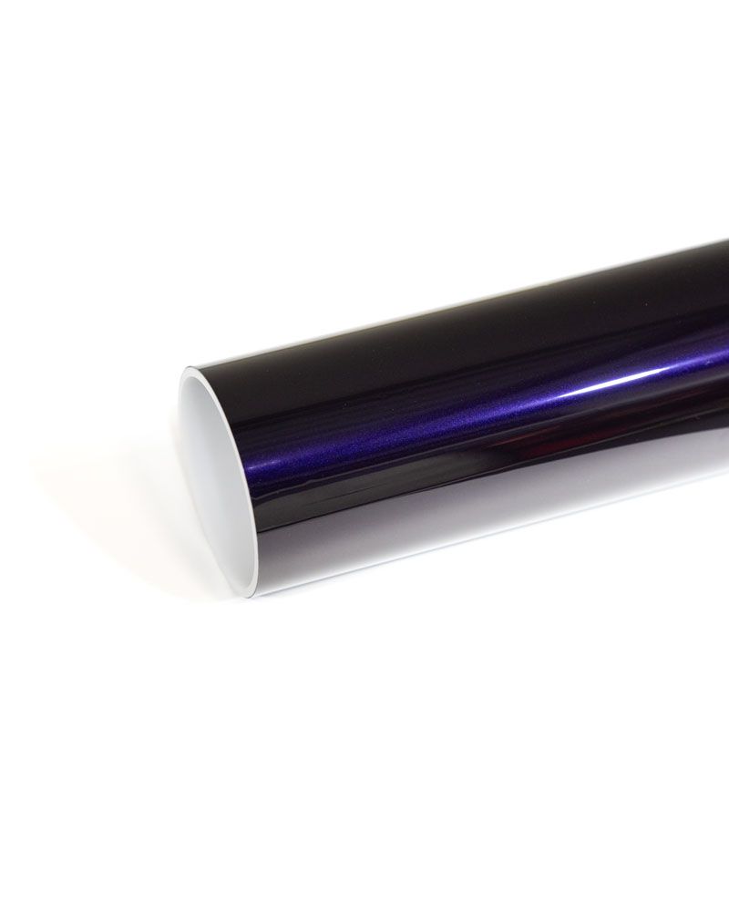 A close up of a black tube on a white background.