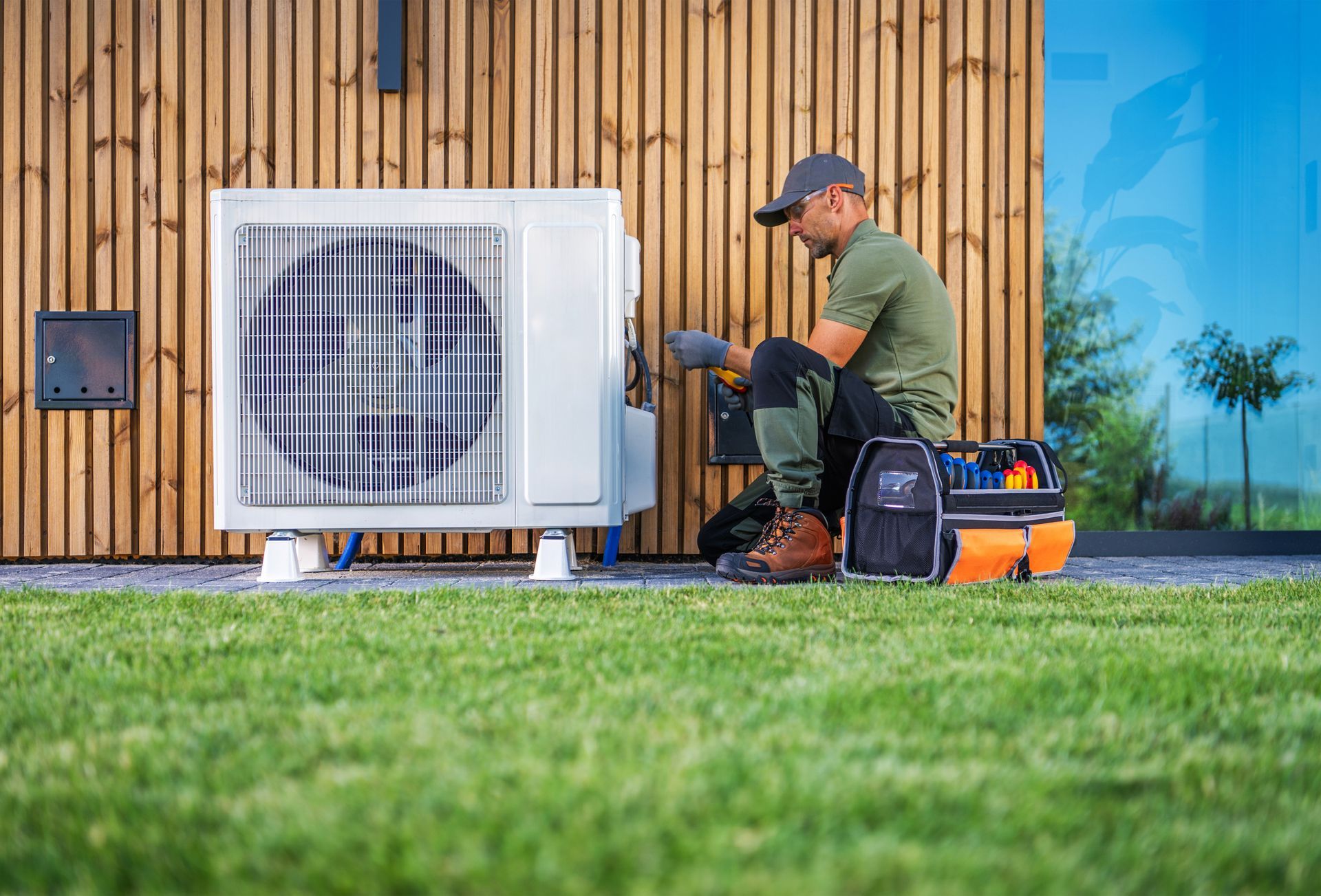 GreenLeaf HVAC heat pump installed outside California home for energy-efficient heating and cooling.