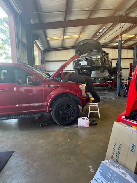 Our Mechanic Repairs an Engine in Magnolia, TX - DK Auto & Diesel Services Inc.