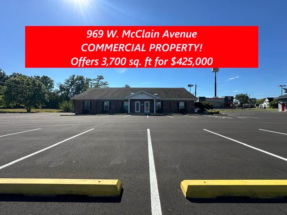 Commercial property at 969 W. McClain Avenue with 3,700 sq. ft. offered for $425,000, with a large parking lot.