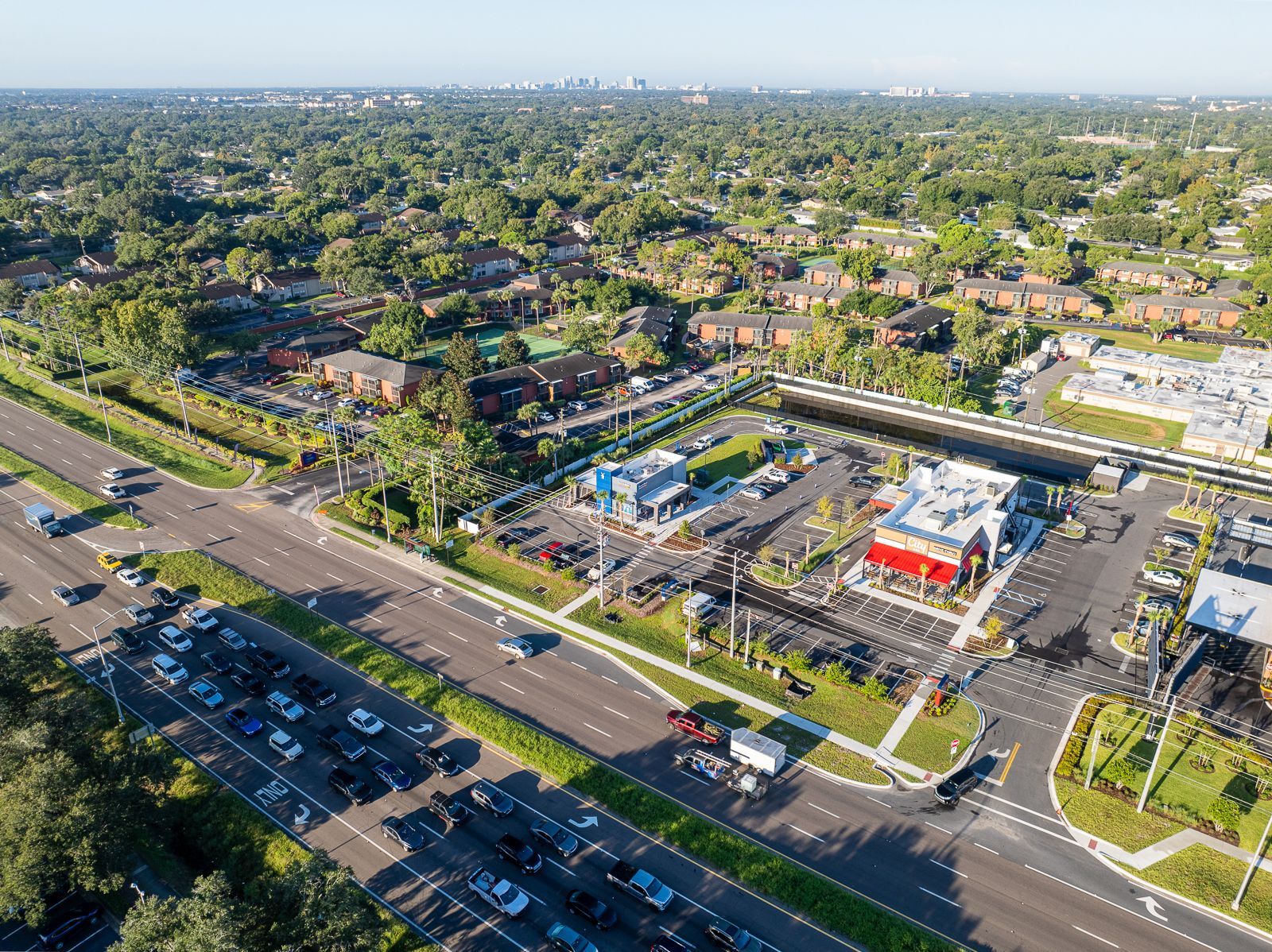 An aerial view of a fast food restaurant in a residential area.