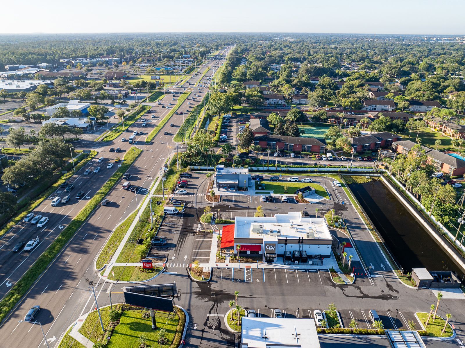 An aerial view of a fast food restaurant in a residential area.