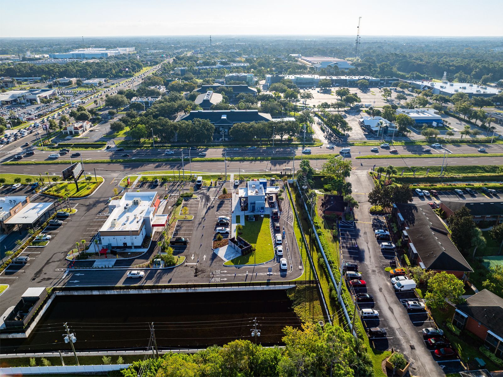 An aerial view of a city with a lot of buildings and trees