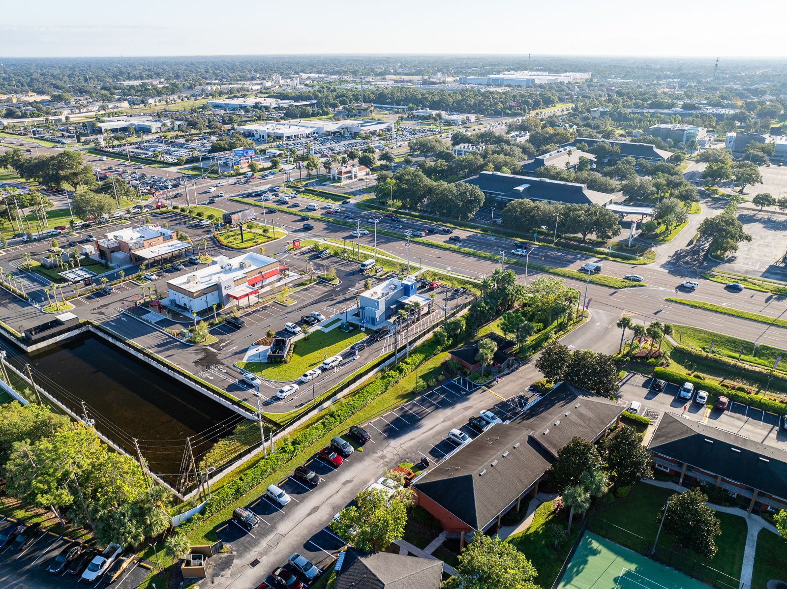An aerial view of a city with a lot of buildings and trees.