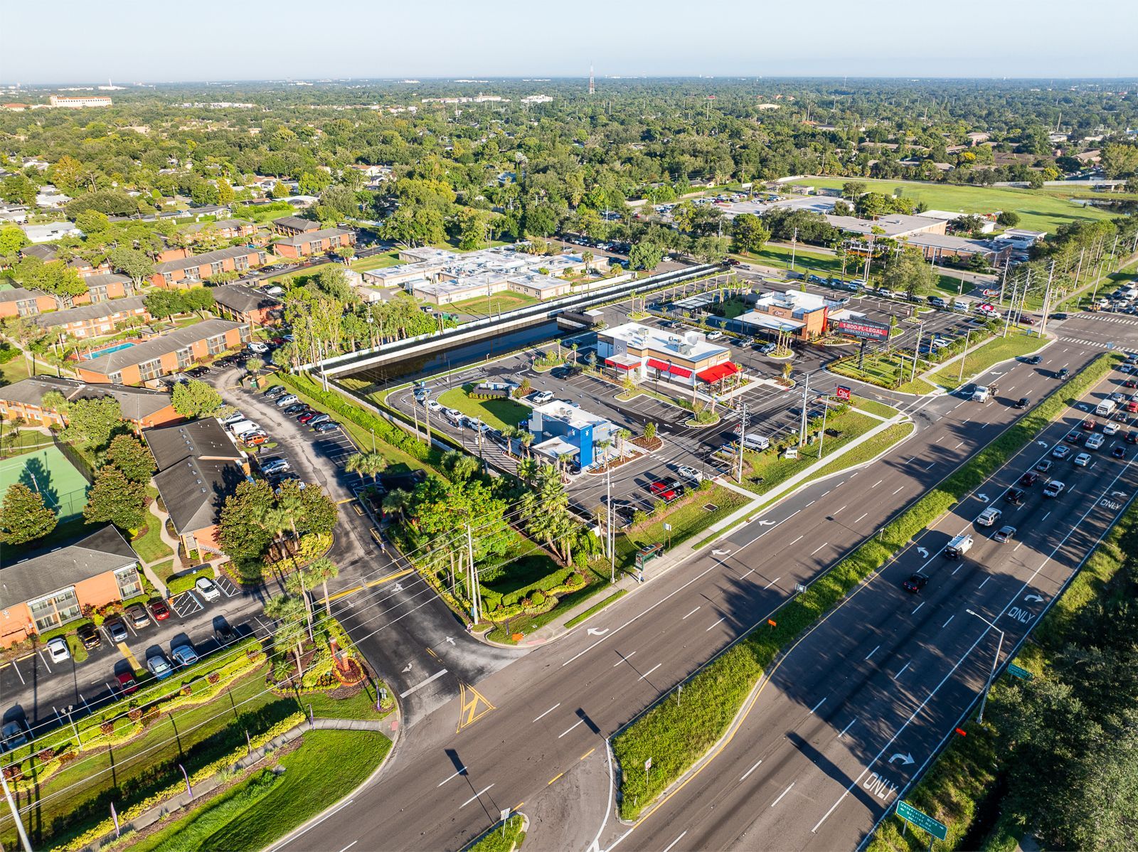An aerial view of a busy intersection with a lot of traffic.