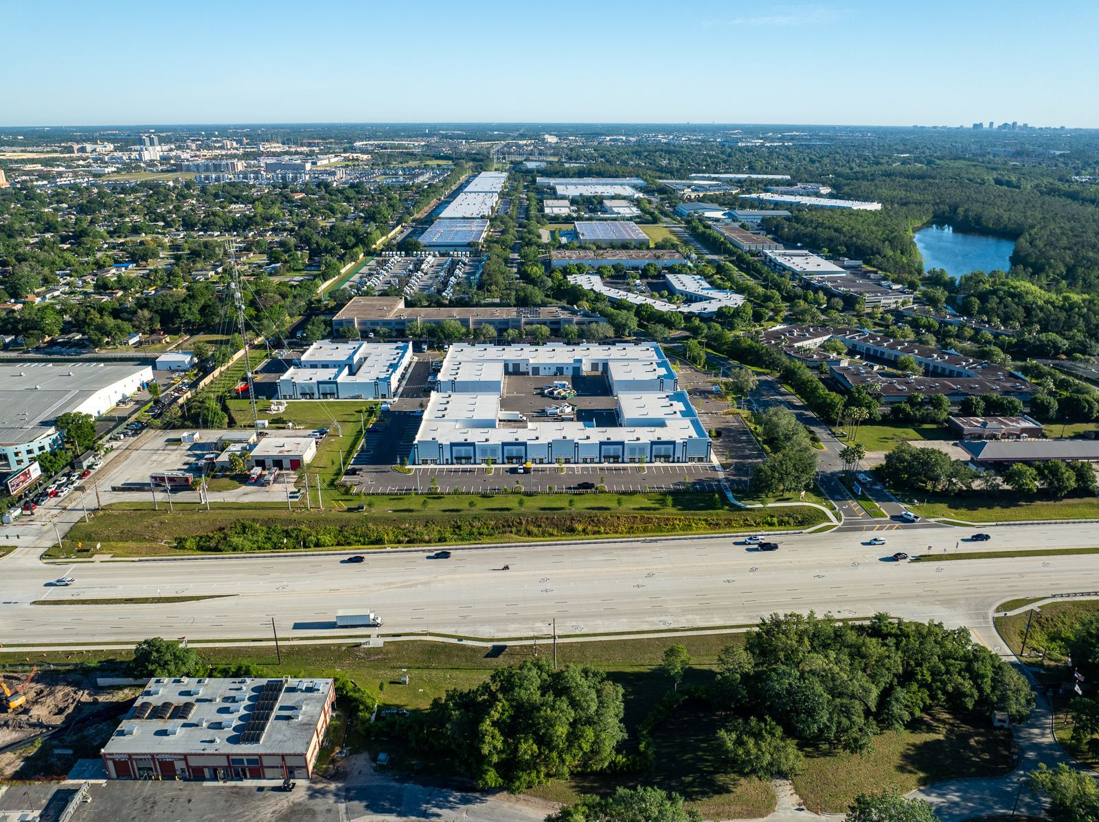 An aerial view of a city with a lot of buildings and trees.