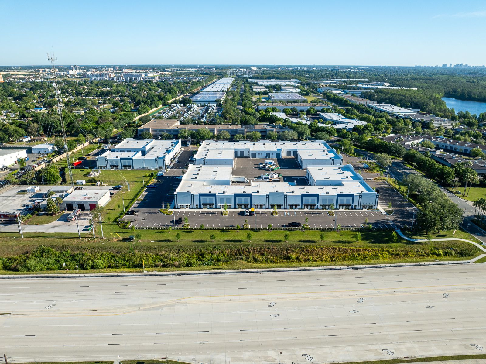 An aerial view of a large building in the middle of a city.