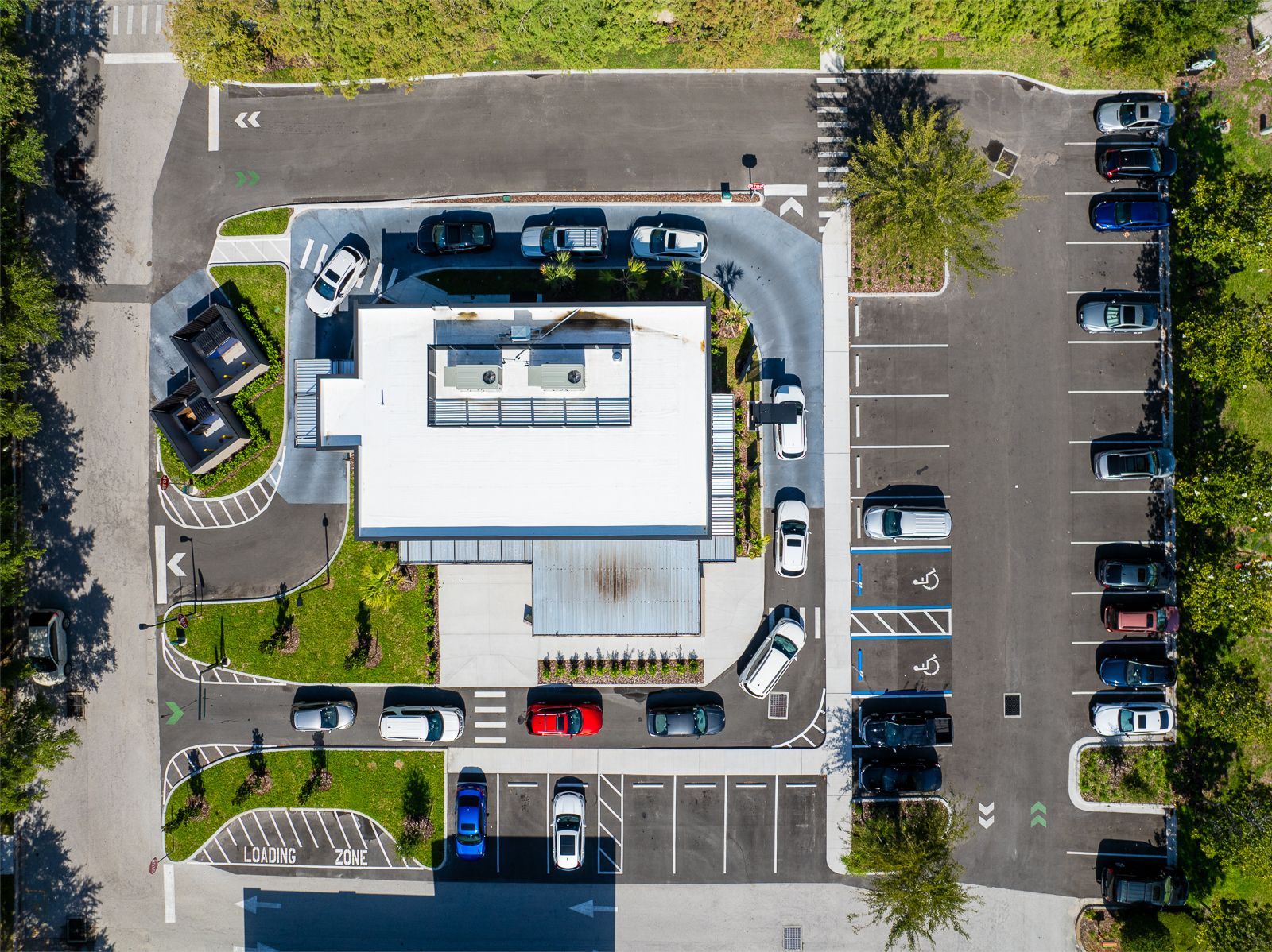 An aerial view of a mcdonald 's parking lot