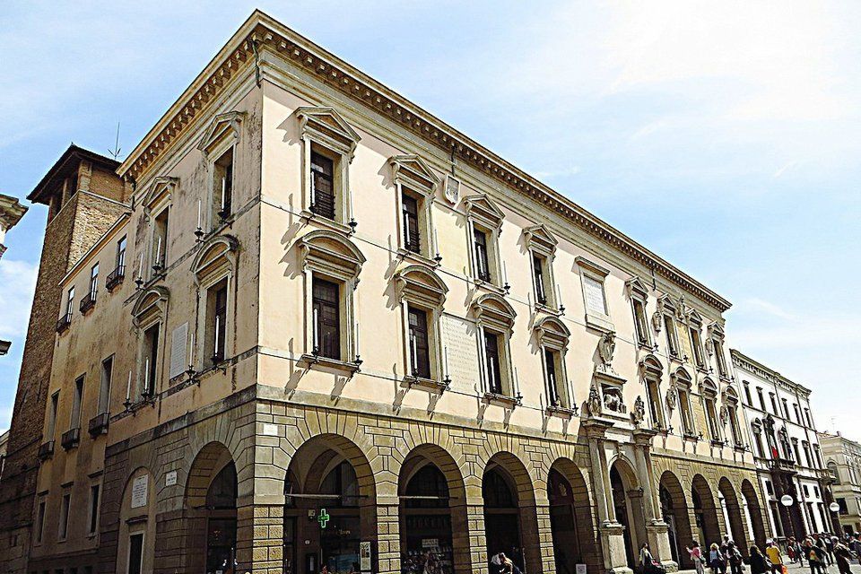 A large building with arches on the side of it