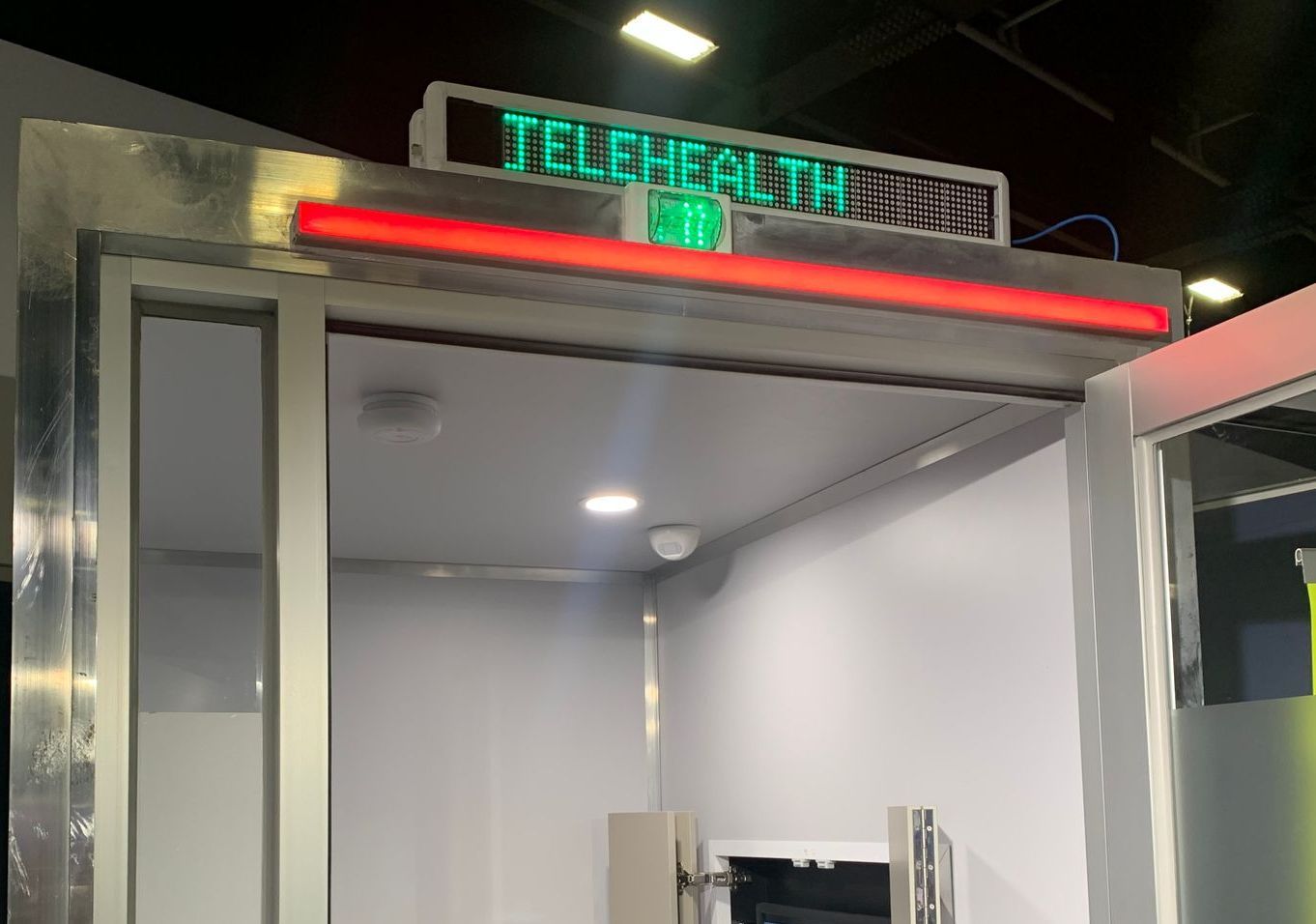 A room with a sign that says telehealth on it