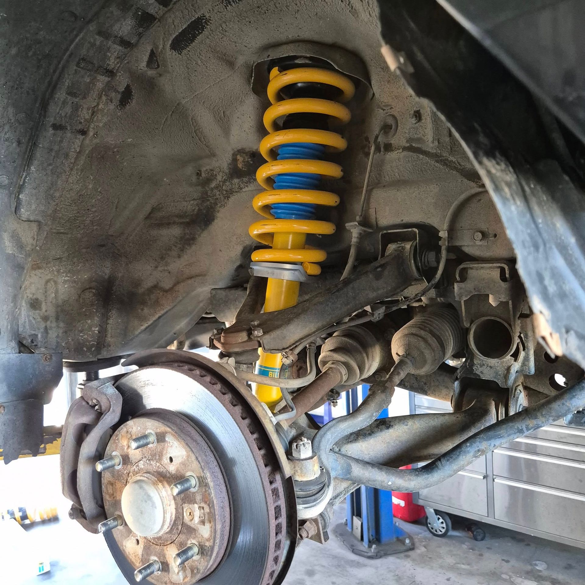 A Car’s Front Suspension Assembly — Dynamic 4X4 Off Road Performance & Mechanical in Garbutt, QLD