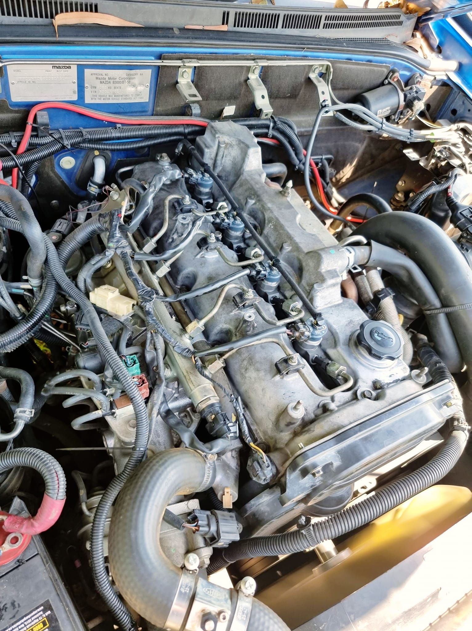 High-angle View of an Open Vehicle Hood — Dynamic 4X4 Off Road Performance & Mechanical in Garbutt, QLD