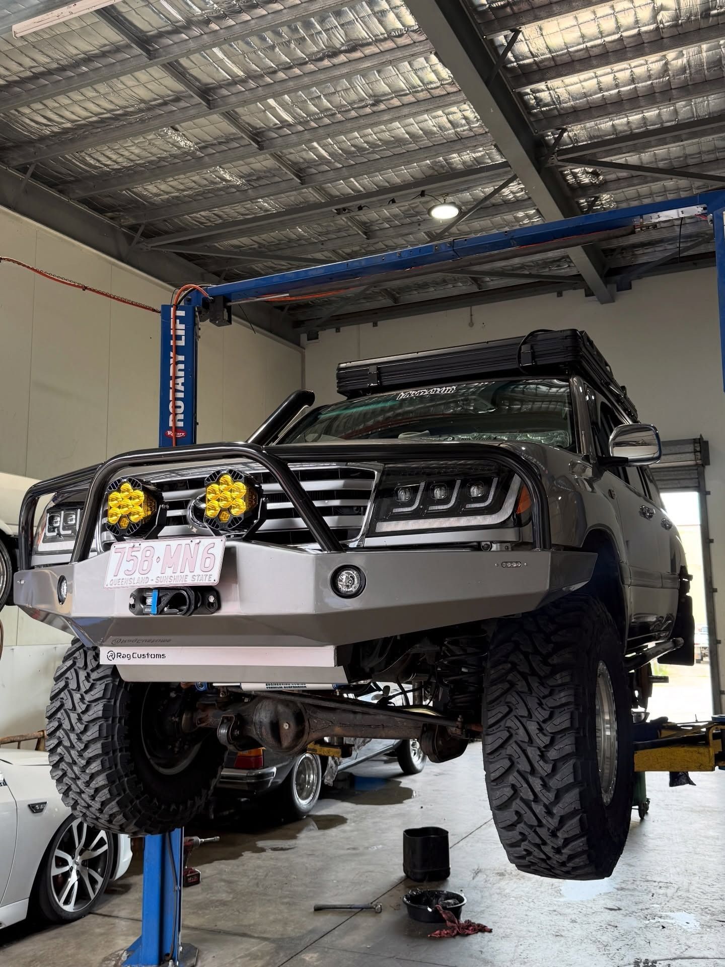 A Gray 4x4 Off-road Vehicle With a Bull Bar — Dynamic 4X4 Off Road Performance & Mechanical in Garbutt, QLD