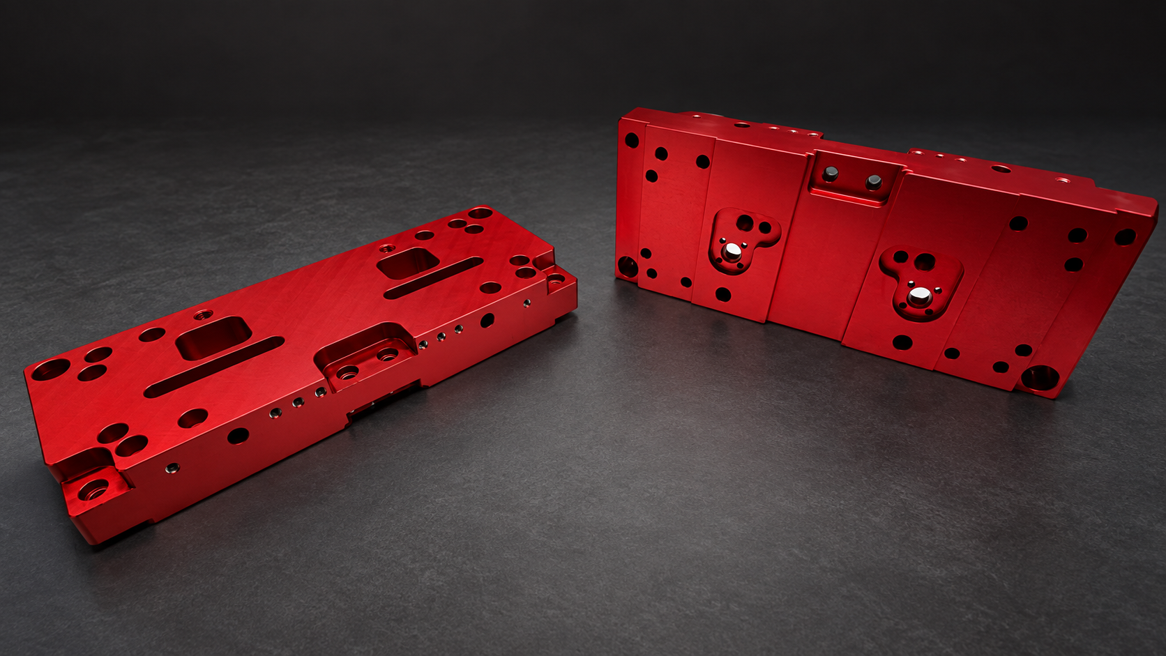 Red anodised precision-machined components