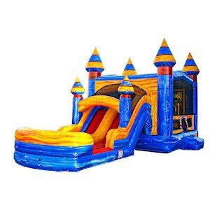 A blue and yellow bouncy castle with a water slide attached to it.