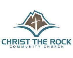 The logo for christ the rock community church shows a mountain with a cross on top of it.