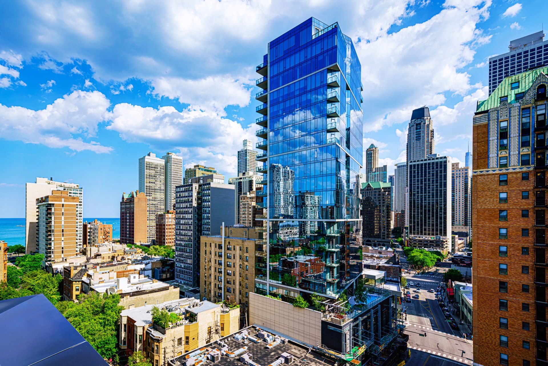 City view of a tall building with a lot of windows.