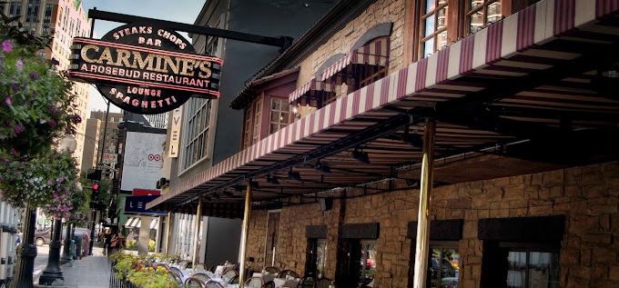 A restaurant with a sign that says carmine 's on it.